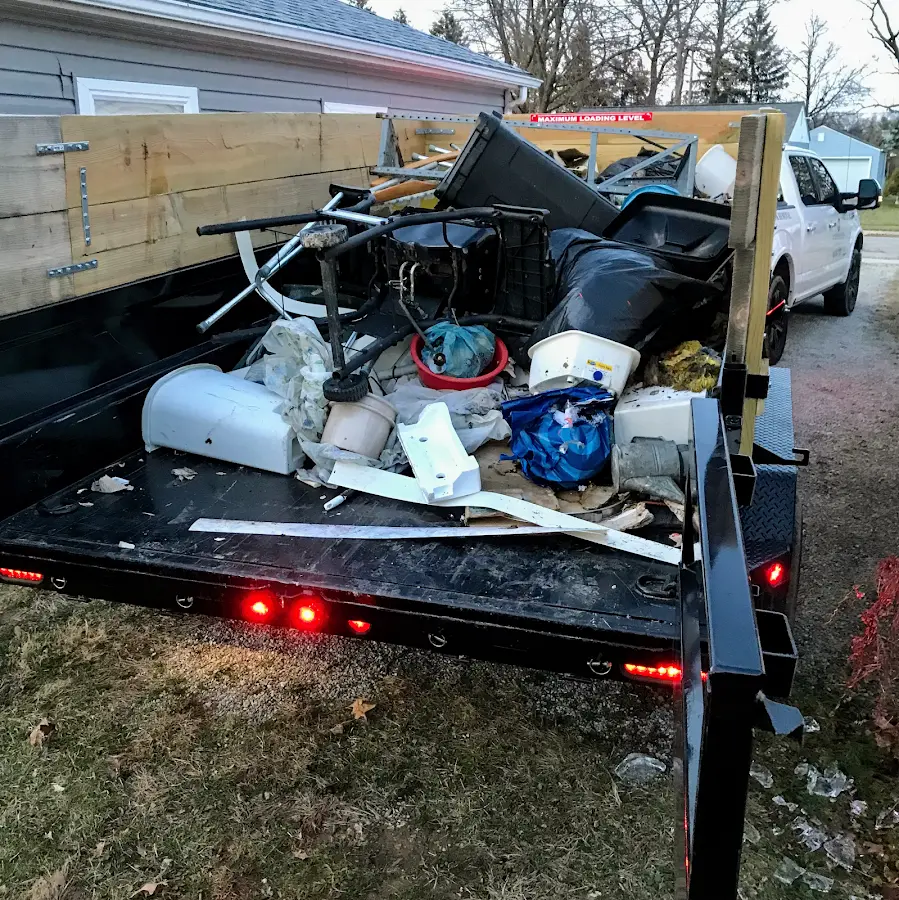 Roll-off dumpster delivered to a residential driveway in Oak Grove